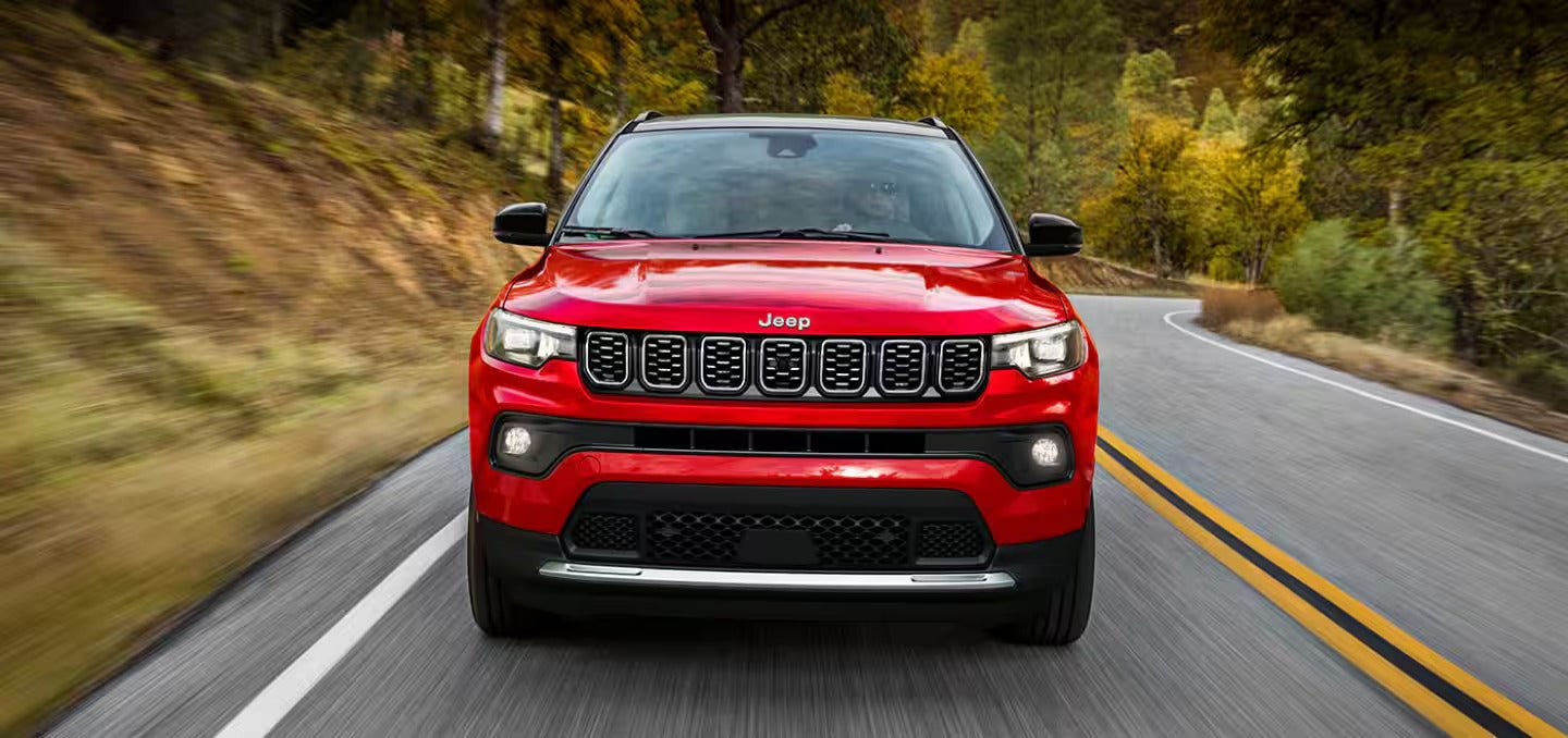 Jeep Compass driving on road